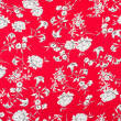 Tkanina sukienkowa - kwiaty na czerwieni 
