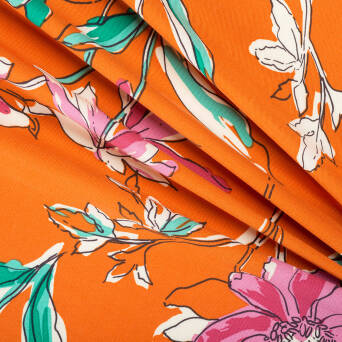 Tkanina sukienkowa - kwiaty na pomarańczu