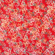 Tkanina wiskozowa FLOWERING PLANTS ON RED RM19528 #01